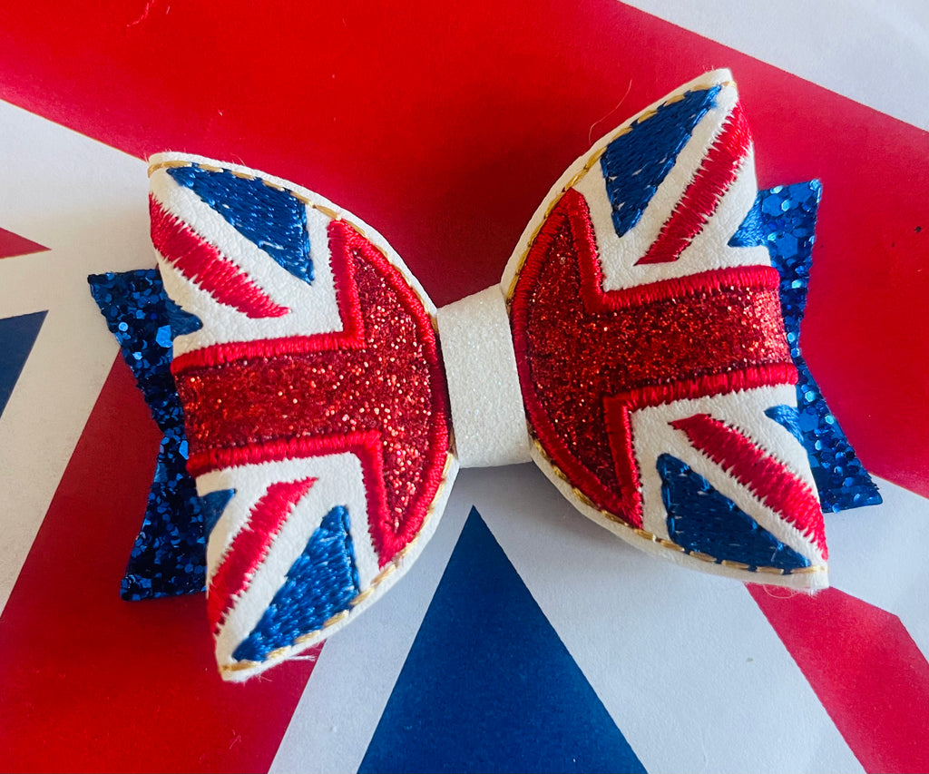 Embroidered Union flag on a royal blue glitter
